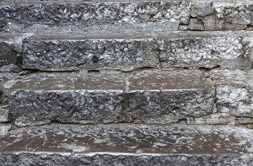 close-up of old stairs. cracked of stone steps texture. selective focus