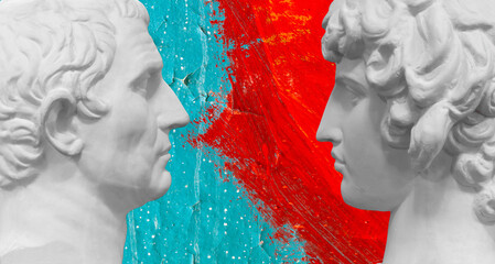 two white busts of men facing each other on a red-blue background
