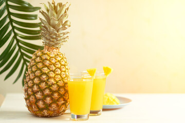 summer beach cocktail, pineapple juice on the table in a glass