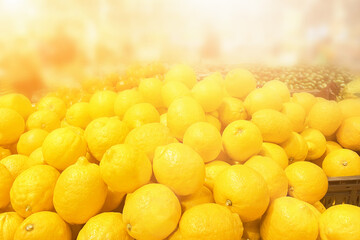 natural lemons on supermarket shelves,juicy ripe yellow fruits,eco food,healthy organic food