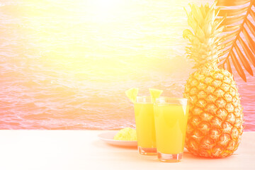 pineapple cocktail, fruit juice at sunset by the pool, summer vacation by the sea on the beach in the sun