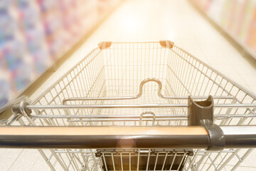 supermarket shopping cart, trolley in shop grocery aisle, store shelves, trading hall, market for...