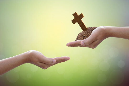 Hand give cross on nature background - Powered by Adobe