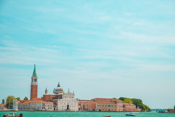 Fototapeta na wymiar view of Church of San Giorgio Maggiore boats before it famous landmark place