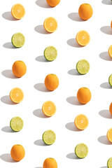 Pattern with citrus sliced orange and lime isolated on white. Abstract vertical summer background