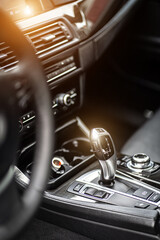 multimedia control panel on the steering wheel of a modern car - obrazy, fototapety, plakaty