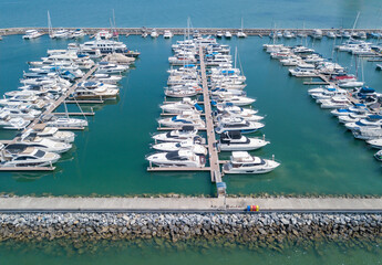 Marine port for yacht, motorboat, sailboat parking service and moorings for luxury and wealthy...