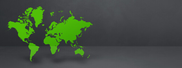 Green world map on black concrete wall background. 3D illustration. Horizontal banner