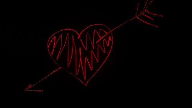 the symbol of a heart pierced by an arrow appears on a black background. looped animation. 3d render