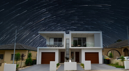 Suburban federation house in Sydney with star trails in the sky NSW Australia 