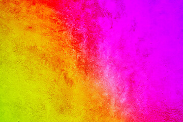 Abstract yellow red purple pattern. Gradient. Toned rough concrete wall surface texture. Close-up. Colorful background with space for design. Backdrop. Modern. Expressive. 