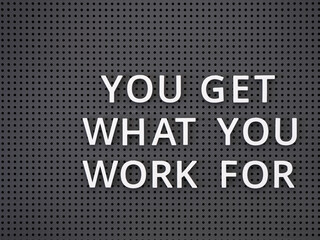 Words You Get What You Work For spelled out with white letters on a gray pegboard