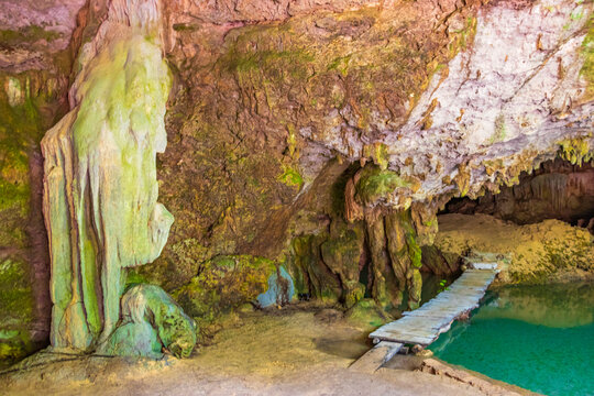 Amazing blue turquoise water and limestone cave sinkhole cenote Mexico.
