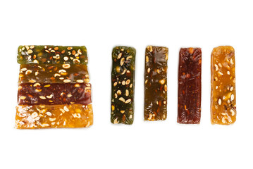 Turkish traditional delight with nuts isolated on white background.
