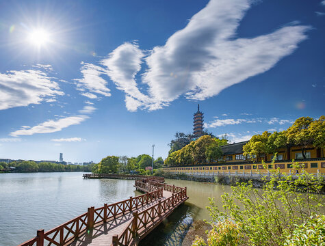 Jinshan Lake corridor bridge of Jinshan Temple in Zhenjiang with blue sky and clouds