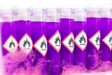 flammable chemicals in test tubes and symbol