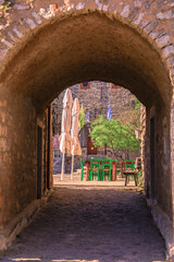 Square with its church at Avgonima village in Chios, Greece