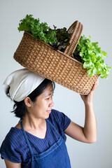 woman with a basket of vegetables