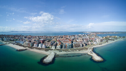 Fototapeta premium Panorama of the top view of the city located on the peninsula and surrounded by the Black Sea