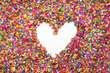 Heart inside a pile of confetti