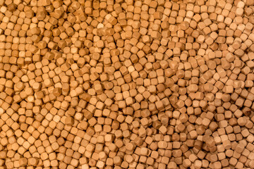 Hinoki cypress small wooden cubes chips for indoor sandpits sensory play playground. mini wooden cubes background