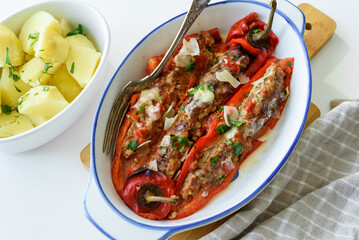 Red pepper stuffed with minced meat in tomato sauce