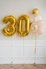 Festive helium balloons in gold and white, number 30
