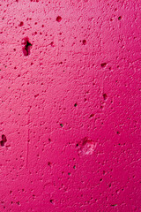 Bright pink plaster wall background