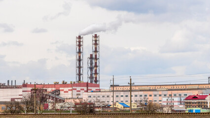 Fototapeta premium Koper for raising ore. Mine buildings. Technology to extract the mineral from underground. Mining. Potassium salt.