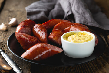 Grilled sausage with mustard sauce