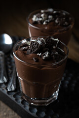 Homemade chocolate pudding with crumbled cookies