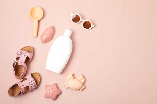 Kids Summer Accesories And Sun Screen Bottle For Sunny Days And Vacations. Sunglasses, Sandals, Sand Molds For Beach Fun Time