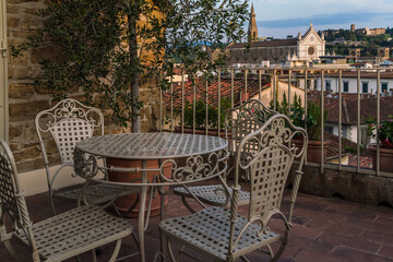 rooftop terrace with view of Florence, Italy and church of Santa Croce 