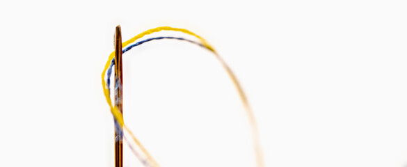 Yellow and blue threads as a symbol of the struggle of the Ukrainian people against russian...