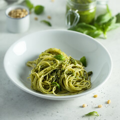 Traditional spaghetti with pesto sauce