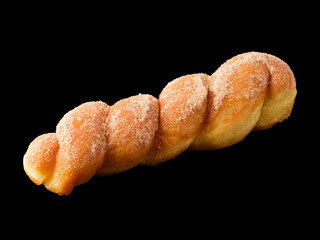 Donut - pigtail with sugar on a black background
