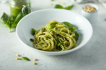 Traditional spaghetti with pesto sauce