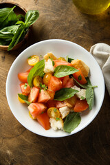Homemade Panzanella salad with fresh basil