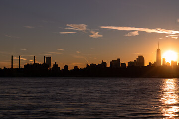 Silhouette of the Manhattan Skyline along the East River during a Sunset in New York City