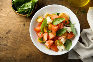 Homemade Panzanella salad with fresh basil