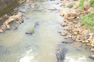water flowing into the river