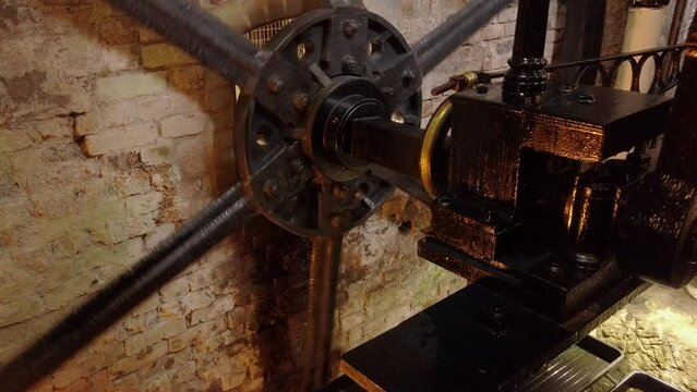An atmospheric engine, used to power a cotton mill. Detail of flywheel and crank