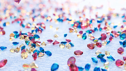 Topaz Rain. Pink, Yellow And Blue Topaz Falling On Light Blue Background