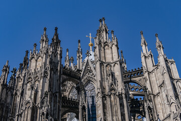 Fototapeta premium Details of Cologne cathedral (Cathedral Church of Saint Peter, from 1248). Cologne Cathedral - High Gothic five-aisled basilica, with a projecting transept and a tower facade. Cologne, Germany.