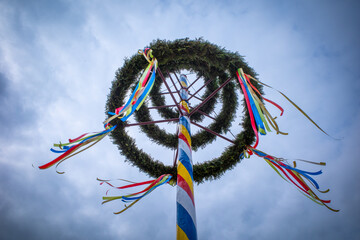  maypole decorated with colorful ribbons - obrazy, fototapety, plakaty