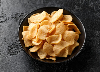 Crispy Prawn Crackers in black bowl with sweet chilli sauce