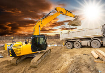 excavator is digging on construction site