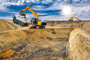 excavator is digging on construction site