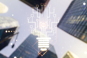 Virtual creative light bulb with chip hologram on blurry cityscape background, artificial Intelligence and neural networks concept. Multiexposure