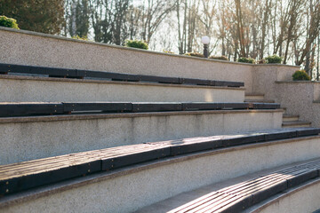 the concrete staircase serves as a theater bench You can also sit on the long, wide stairs while...